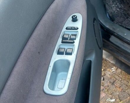 Черный Чери Тигго, объемом двигателя 2.4 л и пробегом 193 тыс. км за 2100 $, фото 13 на Automoto.ua