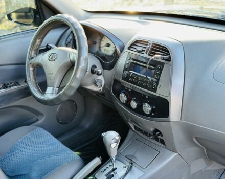 Черный Чери Тигго, объемом двигателя 2.4 л и пробегом 186 тыс. км за 3400 $, фото 12 на Automoto.ua