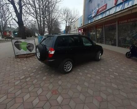 Чорний Чері Тігго, об'ємом двигуна 2.4 л та пробігом 140 тис. км за 3950 $, фото 5 на Automoto.ua