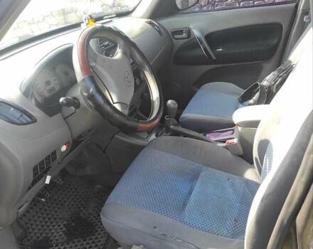 Черный Чери Тигго, объемом двигателя 2.35 л и пробегом 250 тыс. км за 3500 $, фото 3 на Automoto.ua