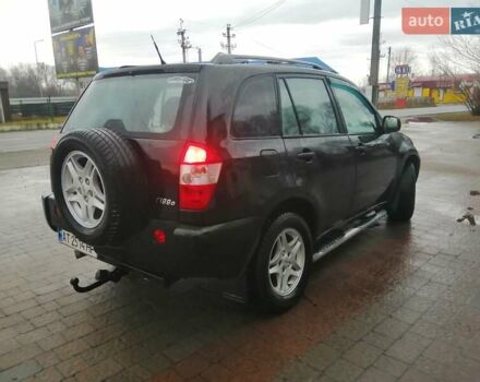 Чорний Чері Тігго, об'ємом двигуна 2 л та пробігом 248 тис. км за 4100 $, фото 1 на Automoto.ua