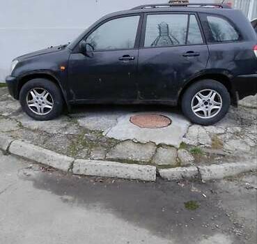 Чорний Чері Тігго, об'ємом двигуна 2 л та пробігом 287 тис. км за 2700 $, фото 2 на Automoto.ua