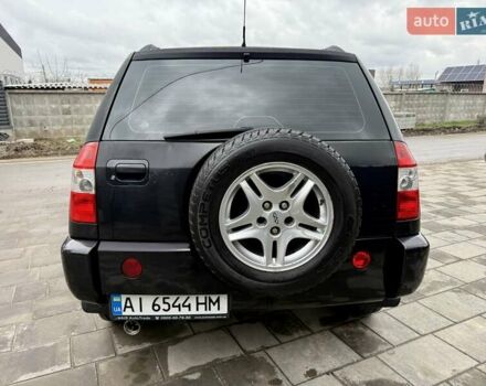 Черный Чери Тигго, объемом двигателя 2.35 л и пробегом 192 тыс. км за 3500 $, фото 3 на Automoto.ua