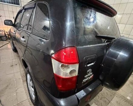 Черный Чери Тигго, объемом двигателя 2.35 л и пробегом 140 тыс. км за 2491 $, фото 2 на Automoto.ua
