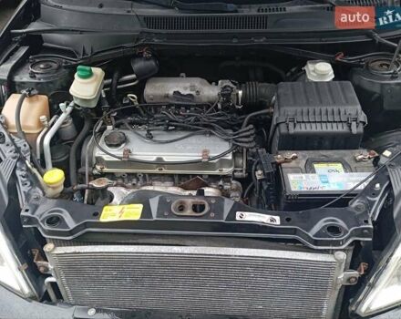 Чорний Чері Тігго, об'ємом двигуна 2 л та пробігом 130 тис. км за 3700 $, фото 7 на Automoto.ua