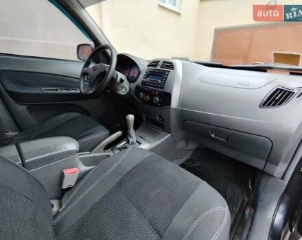 Чорний Чері Тігго, об'ємом двигуна 2 л та пробігом 170 тис. км за 4300 $, фото 8 на Automoto.ua