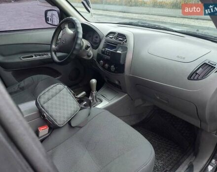 Чорний Чері Тігго, об'ємом двигуна 2 л та пробігом 436 тис. км за 3100 $, фото 18 на Automoto.ua