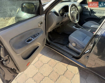 Черный Чери Тигго, объемом двигателя 2.4 л и пробегом 333 тыс. км за 3000 $, фото 9 на Automoto.ua