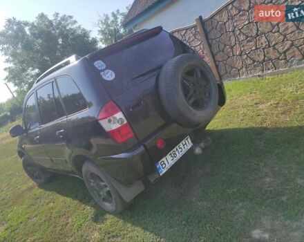 Черный Чери Тигго, объемом двигателя 2.35 л и пробегом 250 тыс. км за 3500 $, фото 5 на Automoto.ua