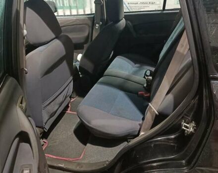 Чорний Чері Тігго, об'ємом двигуна 2 л та пробігом 110 тис. км за 2500 $, фото 6 на Automoto.ua