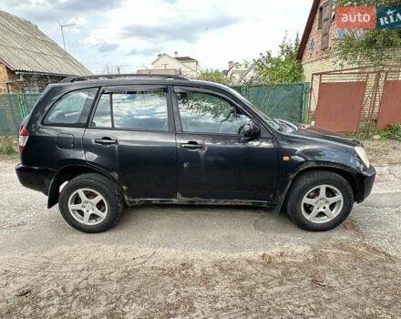 Черный Чери Тигго, объемом двигателя 2.35 л и пробегом 170 тыс. км за 2750 $, фото 6 на Automoto.ua