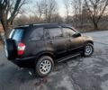 Черный Чери Тигго, объемом двигателя 2.4 л и пробегом 193 тыс. км за 2100 $, фото 7 на Automoto.ua