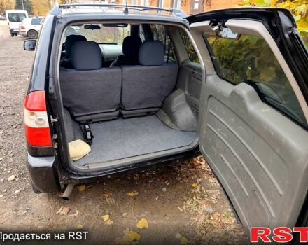 Чорний Чері Тігго, об'ємом двигуна 2.4 л та пробігом 157 тис. км за 3000 $, фото 7 на Automoto.ua