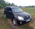 Чорний Чері Тігго, об'ємом двигуна 2 л та пробігом 250 тис. км за 2850 $, фото 1 на Automoto.ua