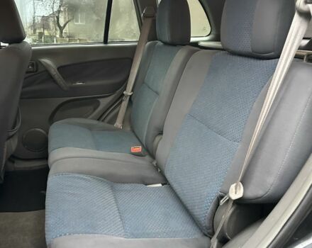 Черный Чери Тигго, объемом двигателя 2.4 л и пробегом 200 тыс. км за 3850 $, фото 7 на Automoto.ua