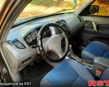 Чорний Чері Тігго, об'ємом двигуна 2 л та пробігом 177 тис. км за 3800 $, фото 1 на Automoto.ua