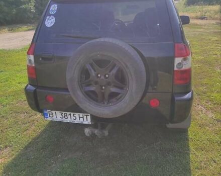 Черный Чери Тигго, объемом двигателя 2.35 л и пробегом 250 тыс. км за 3500 $, фото 1 на Automoto.ua