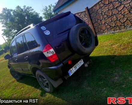 Черный Чери Тигго, объемом двигателя 2.4 л и пробегом 250 тыс. км за 3600 $, фото 2 на Automoto.ua