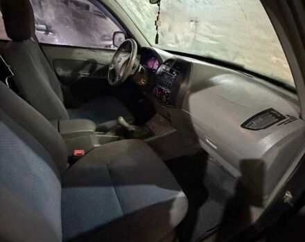 Черный Чери Тигго, объемом двигателя 2.35 л и пробегом 140 тыс. км за 2491 $, фото 5 на Automoto.ua