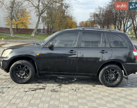 Черный Чери Тигго, объемом двигателя 2.35 л и пробегом 165 тыс. км за 3700 $, фото 5 на Automoto.ua