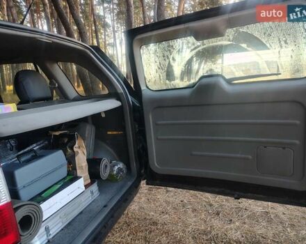 Черный Чери Тигго, объемом двигателя 2 л и пробегом 134 тыс. км за 4200 $, фото 14 на Automoto.ua