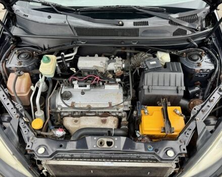 Черный Чери Тигго, объемом двигателя 2.4 л и пробегом 196 тыс. км за 3500 $, фото 7 на Automoto.ua