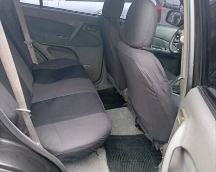 Чорний Чері Тігго, об'ємом двигуна 2 л та пробігом 130 тис. км за 3700 $, фото 6 на Automoto.ua