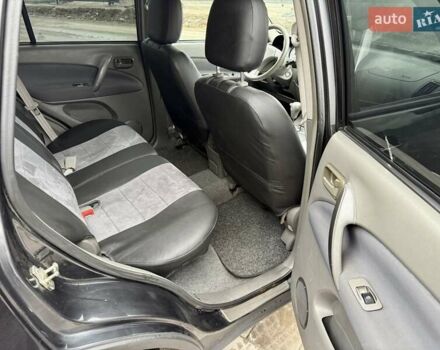 Черный Чери Тигго, объемом двигателя 2.35 л и пробегом 192 тыс. км за 3500 $, фото 13 на Automoto.ua