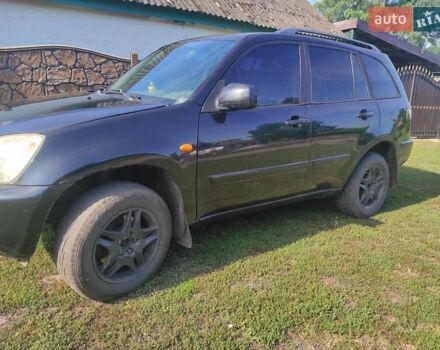 Черный Чери Тигго, объемом двигателя 2.35 л и пробегом 250 тыс. км за 3500 $, фото 4 на Automoto.ua