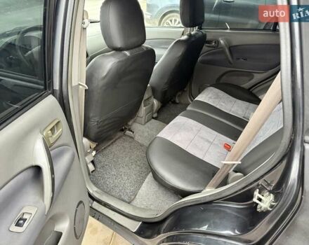 Черный Чери Тигго, объемом двигателя 2.35 л и пробегом 192 тыс. км за 3500 $, фото 10 на Automoto.ua