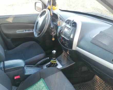 Черный Чери Тигго, объемом двигателя 1.6 л и пробегом 167 тыс. км за 3700 $, фото 5 на Automoto.ua