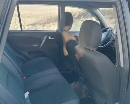 Черный Чери Тигго, объемом двигателя 1.6 л и пробегом 167 тыс. км за 3700 $, фото 6 на Automoto.ua