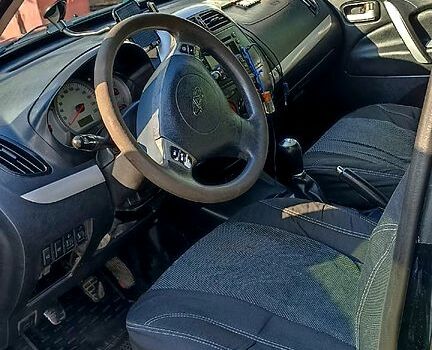 Чорний Чері Тігго, об'ємом двигуна 2 л та пробігом 174 тис. км за 5000 $, фото 3 на Automoto.ua