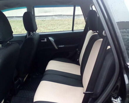 Чері Тігго 2011 у Черкасах на Automoto.ua Чорний Чері Тігго, об'ємом двигуна 2 л та пробігом 58 тис. км за 12000 $, фото 5 на Automoto.ua