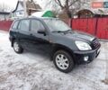 Черный Чери Тигго, объемом двигателя 1.6 л и пробегом 100 тыс. км за 5200 $, фото 2 на Automoto.ua