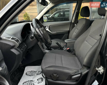 Черный Чери Тигго, объемом двигателя 1.85 л и пробегом 140 тыс. км за 5699 $, фото 21 на Automoto.ua