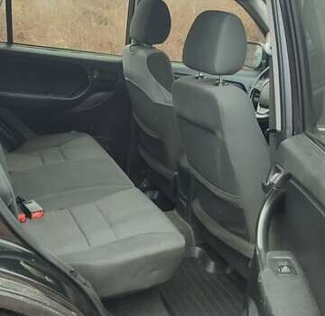 Чорний Чері Тігго, об'ємом двигуна 1.8 л та пробігом 171 тис. км за 4500 $, фото 1 на Automoto.ua