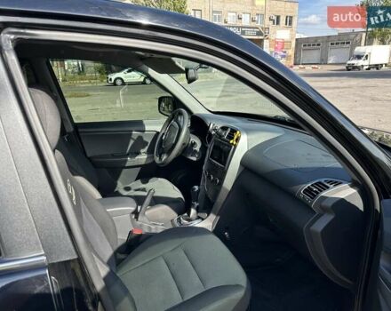 Черный Чери Тигго, объемом двигателя 1.85 л и пробегом 79 тыс. км за 5500 $, фото 7 на Automoto.ua