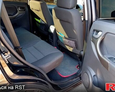 Черный Чери Тигго, объемом двигателя 1.8 л и пробегом 178 тыс. км за 5600 $, фото 10 на Automoto.ua