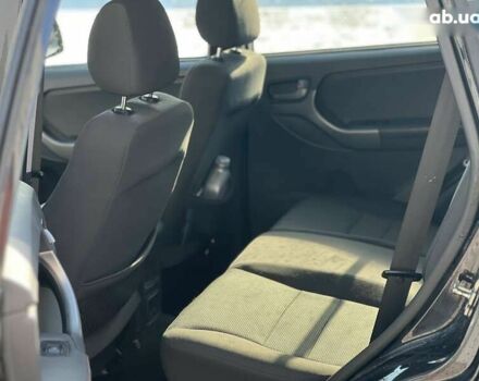 Черный Чери Тигго, объемом двигателя 1.8 л и пробегом 104 тыс. км за 5700 $, фото 17 на Automoto.ua