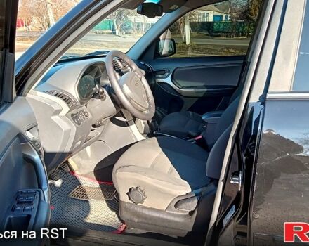 Черный Чери Тигго, объемом двигателя 1.8 л и пробегом 178 тыс. км за 5600 $, фото 7 на Automoto.ua