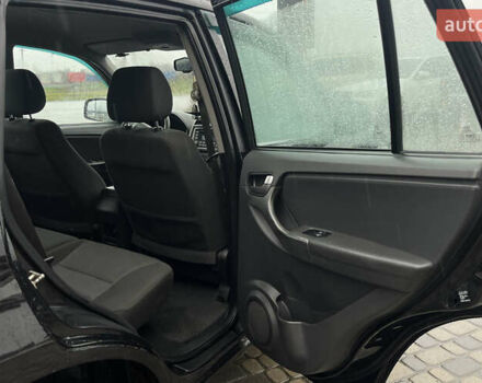 Черный Чери Тигго, объемом двигателя 1.85 л и пробегом 206 тыс. км за 6100 $, фото 21 на Automoto.ua