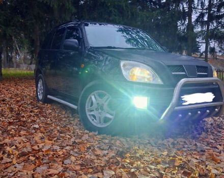 Чорний Чері Тігго, об'ємом двигуна 2 л та пробігом 240 тис. км за 3500 $, фото 1 на Automoto.ua