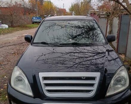 Чорний Чері Тігго, об'ємом двигуна 2 л та пробігом 259 тис. км за 4200 $, фото 1 на Automoto.ua