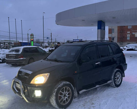 Черный Чери Тигго, объемом двигателя 2 л и пробегом 250 тыс. км за 2300 $, фото 1 на Automoto.ua