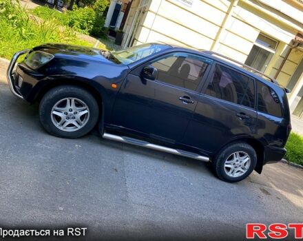 Черный Чери Тигго, объемом двигателя 2 л и пробегом 260 тыс. км за 3200 $, фото 1 на Automoto.ua