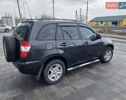 Чорний Чері Тігго, об'ємом двигуна 2 л та пробігом 436 тис. км за 3100 $, фото 1 на Automoto.ua