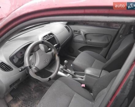 Червоний Чері Тігго, об'ємом двигуна 2 л та пробігом 156 тис. км за 2000 $, фото 6 на Automoto.ua