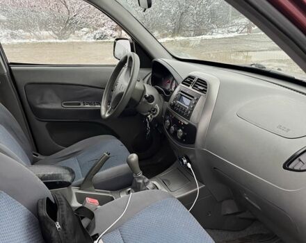 Красный Чери Тигго, объемом двигателя 2 л и пробегом 185 тыс. км за 2999 $, фото 12 на Automoto.ua