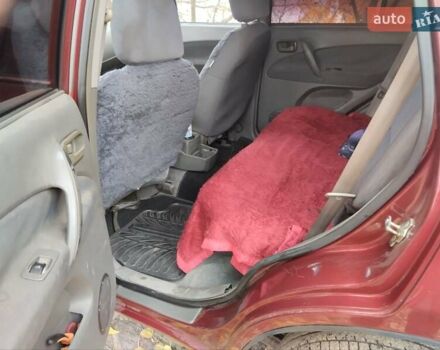 Чері Тігго 2007 у Дніпро (Дніпропетровську) на Automoto.ua Червоний Чері Тігго, об'ємом двигуна 2 л та пробігом 244 тис. км за 3700 $, фото 1 на Automoto.ua